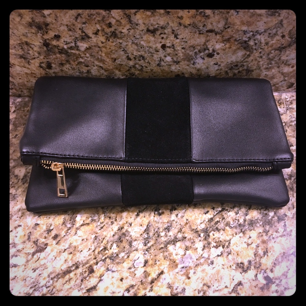 Black suede and faux leather clutch